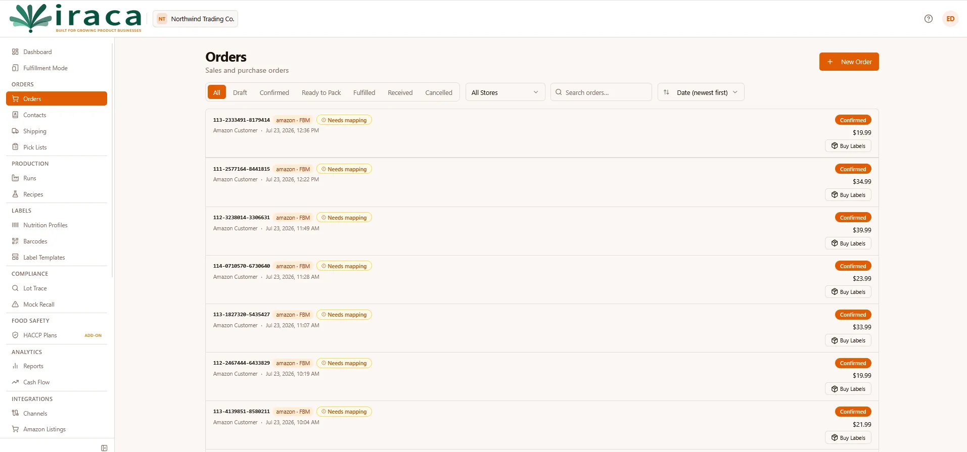 The Iraca orders screen listing imported Amazon orders with their status and totals